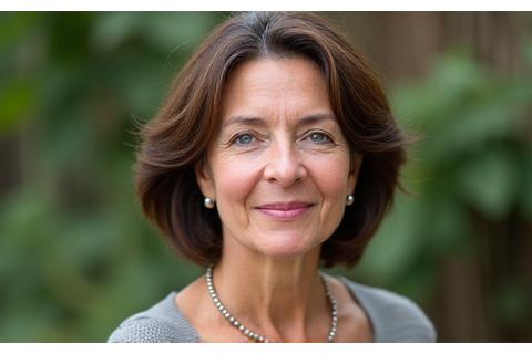 Portrait of Dr. Elara Vance, an environmental anthropologist and cultural liaison, looking thoughtful.